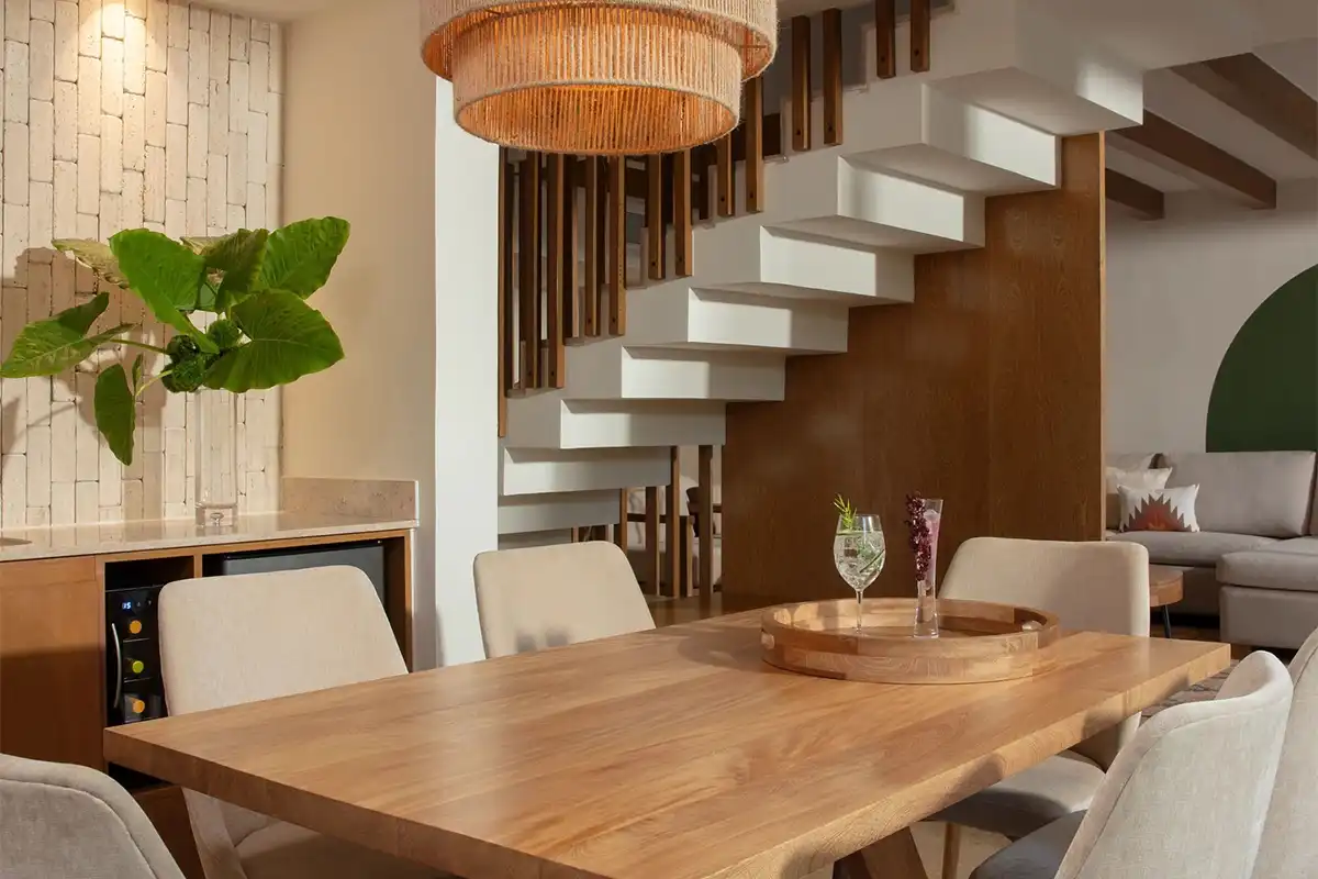 Dining room of a two-story villa suite.