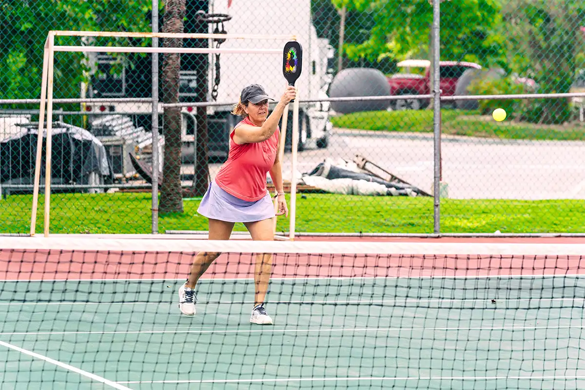 A guest playing pickleball.