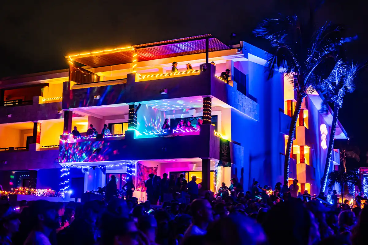 A photo from the main stage beach crowd looking up at the Ocean Front Suite balconies.